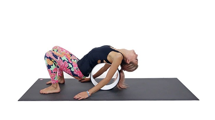 6 Ways to Improve Your Backbends Using a Yoga Wheel - Yoga with