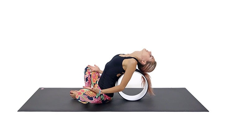 Yoga Wheel: 5 Ways to Use This Prop (Photo Tutorial)