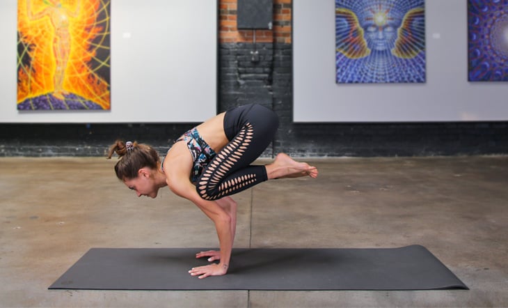 Taking Flight in Crow Pose - Michelle Chan